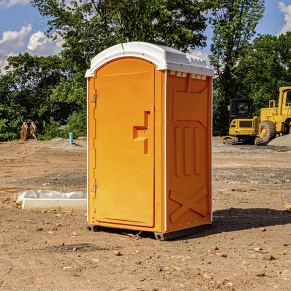 how often are the portable restrooms cleaned and serviced during a rental period in Portal North Dakota